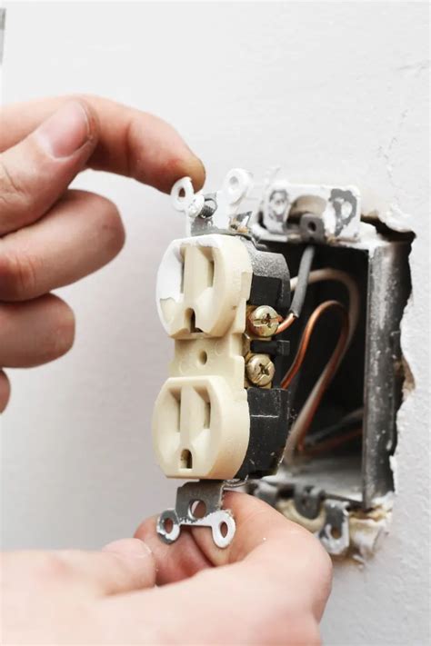 change an electric outlet box|replacing a wall outlet.